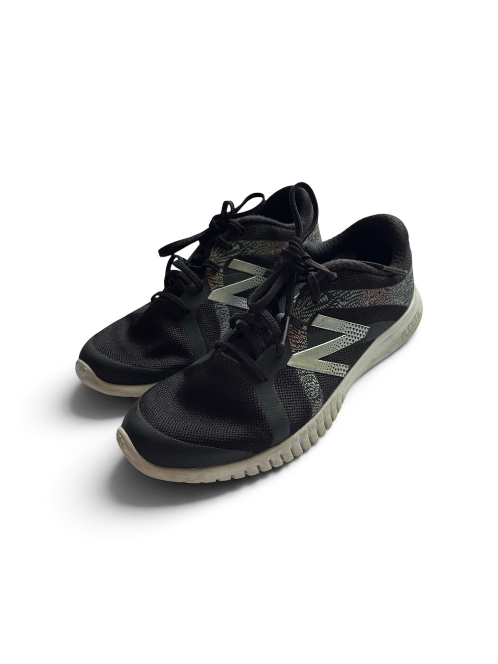 New Balance Women’s Black Sneakers with Silver Logo